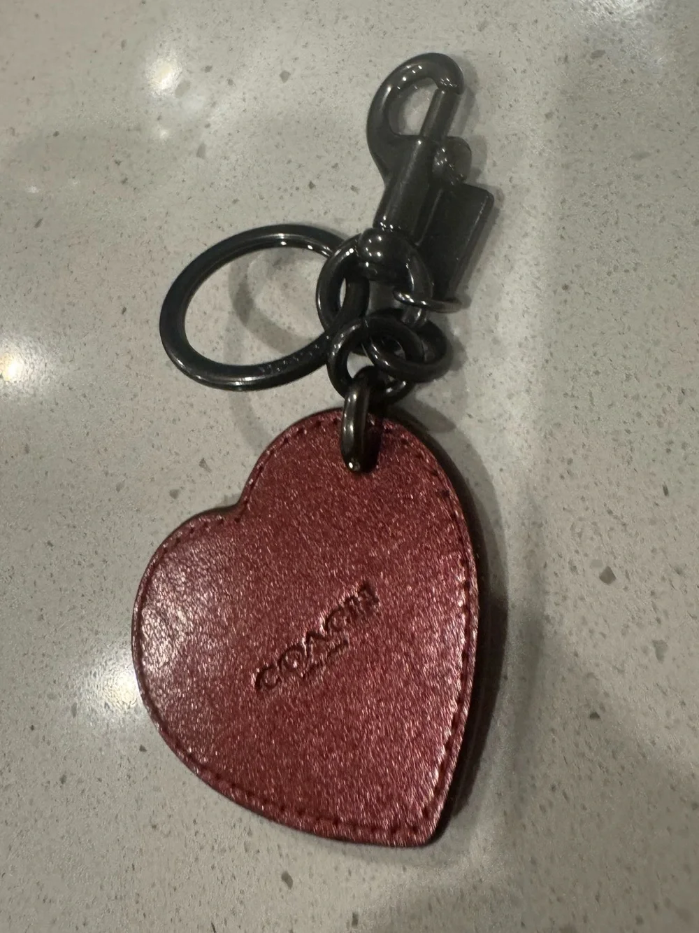 Coach red metallic